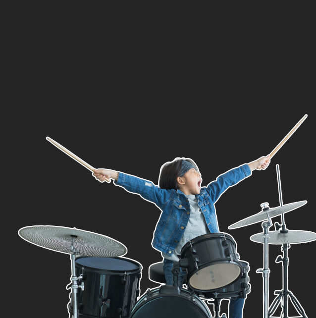 Young boy on drums rocking out